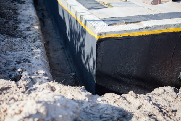 Professional Waterproofing technician working in Alpha, OH
